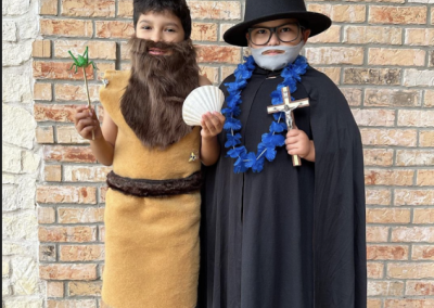 Saint Damien of Molokai and Saint John the Baptist